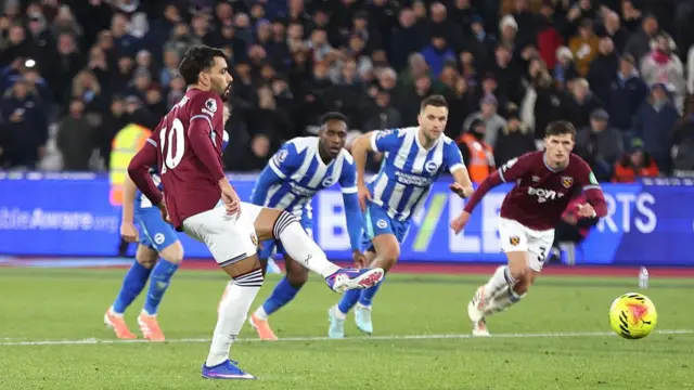 Lucas Paqueta scores his penalty