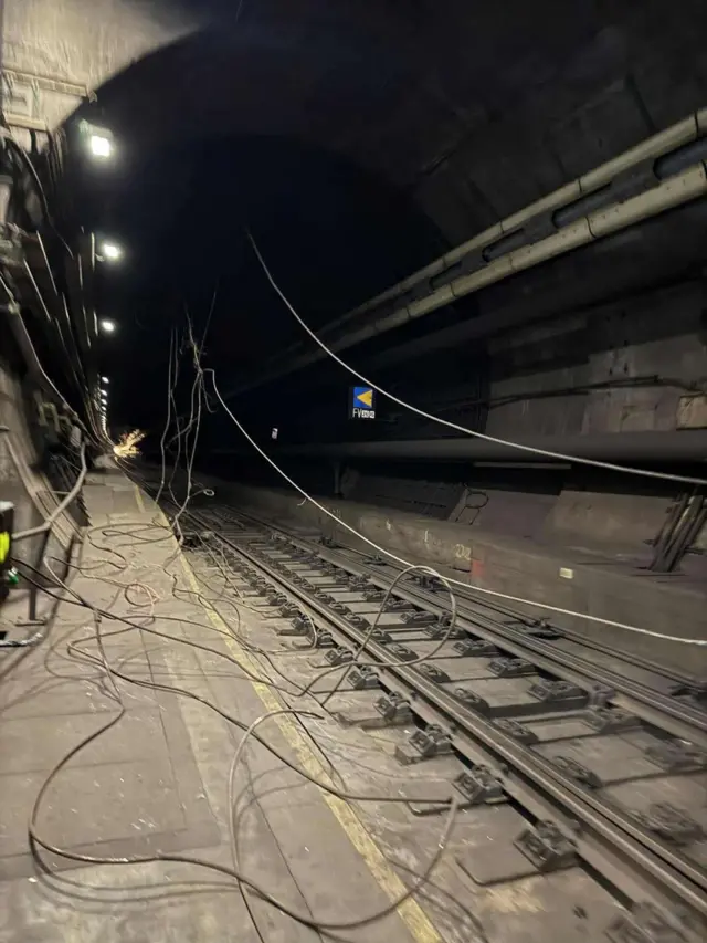 Damage in the Channel Tunnel including fallen wires