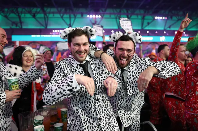 Men dress as dalmations