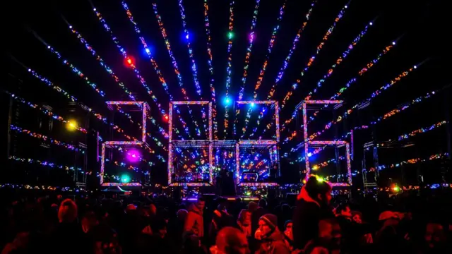 Crowds gathered for an early fireworks and light show for children at Museumplein, Amsterdam.