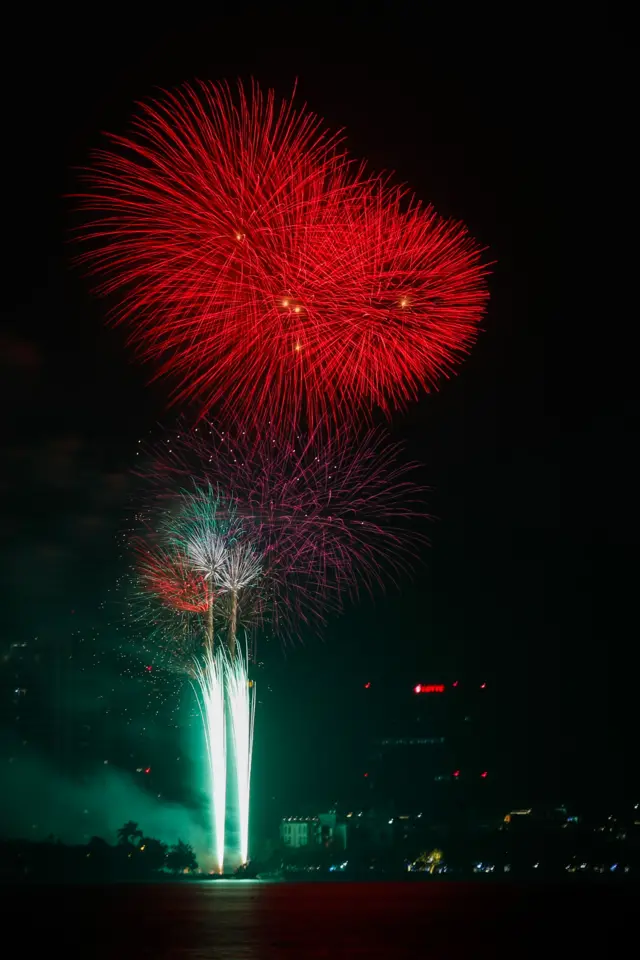 Fireworks illuminate the sky during the New Year's Eve celebrations in Hanoi, Vietnam.