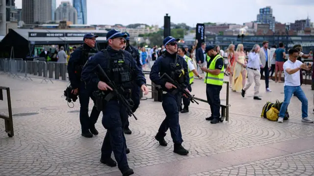 Police on guard at Opera House ahead of the New Year's Eve fireworks display on December 31, 2025 in Sydney, Australia. Thousands will turn out to celebrate New Year's Eve in Sydney, as the Harbour Bridge lit up with fireworks.