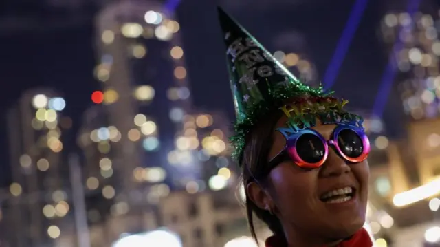 A woman wearing sunglasses in Dubai during the celebrations for new year