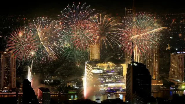 Fireworks explode during the New Year celebrations in Bangkok.