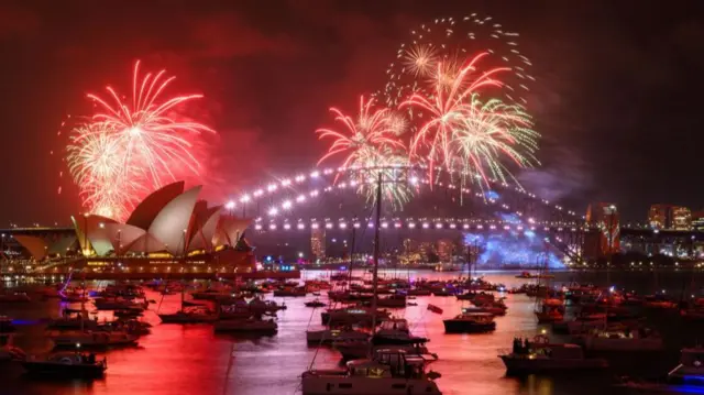 Fireworks light up the sky over Sydney Harbour during the 9 pm Calling Country display of the New Year's Eve Celebrations at Mrs Macquaries Point in Sydney, Australia, December 31, 2025.
