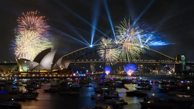Fireworks light up the sky over Sydney Harbour during the 9 pm Calling Country display of the New Year's Eve Celebrations at Mrs Macquaries Point in Sydney, Australia, December 31, 2025.