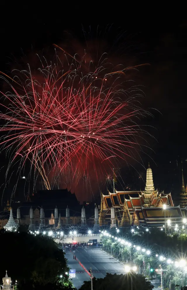 Fireworks explode during the New Year celebrations in Bangkok, Thailand