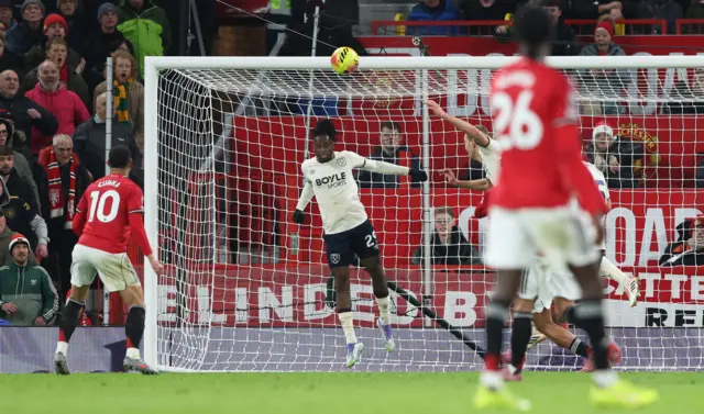 Aaron Wan-Bissaka makes a goalline clearance