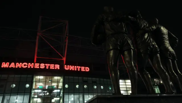 General view of the trinity statue in front of old trafford