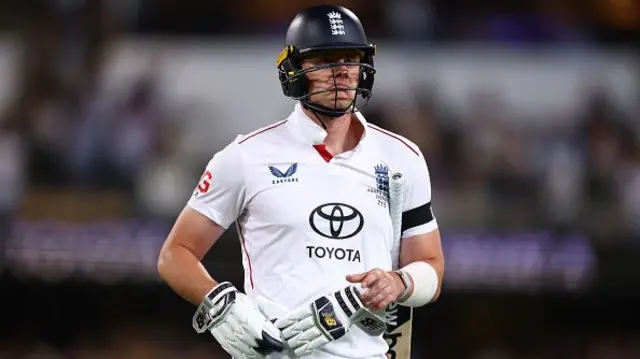 Jamie Smith of England walks off after he was dismissed by Scott Boland
