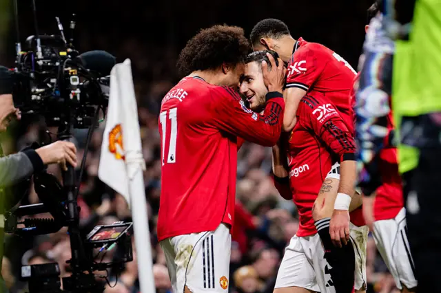 Diogo Dalot celebrates with his teammates