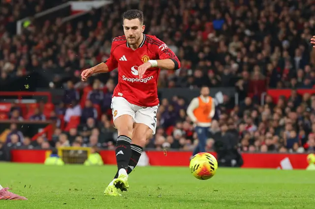 Diogo Dalot shoots