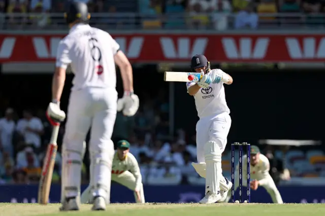England's Joe Root plays a shot on day one