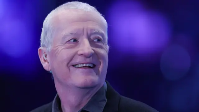 Steve Davis smiles
