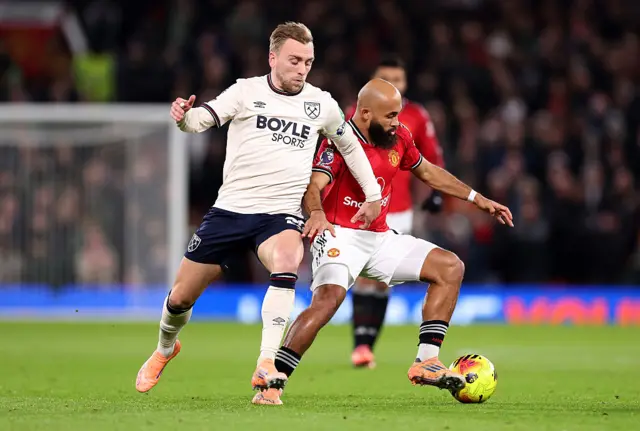 Bryan Mbeumo holds off the challenge of Jarrod Bowen