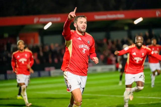 Salford's Matt Butcher celebrates scoring against Crawley in League Two