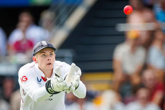 England's wicketkeeper Jamie Smith catches the ball