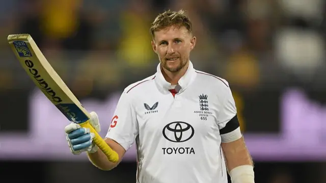 Joe Root celebrating his century