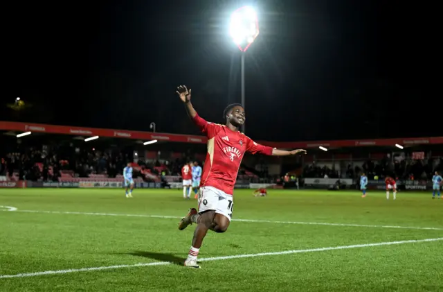 Salford's Kelly N'Mai celebrates scoring against Leyton Orient