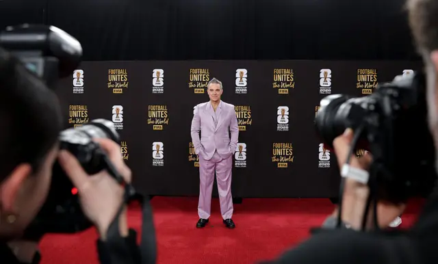 Robbie Williams arrive for World Cup draw.