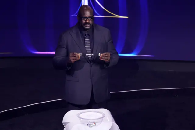 Shaquille O'Neal draws Senegal from pot 2 during the 2026 FIFA World Cup draw at the John F. Kennedy Center for the Performing Arts, Washington, United States. Picture date: Friday December 5, 2025. PA