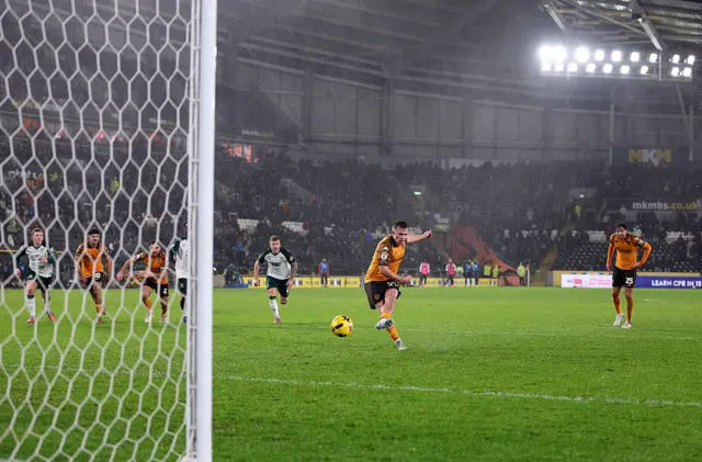 Joe Gelhardt of Hull City scores his team's first goal from the penalty spot