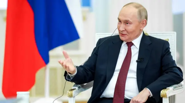 Putin speaking to journalists
