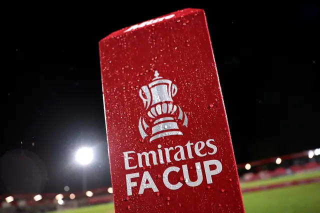 An FA Cup sign on the pitch before Salford v Leyton Orient