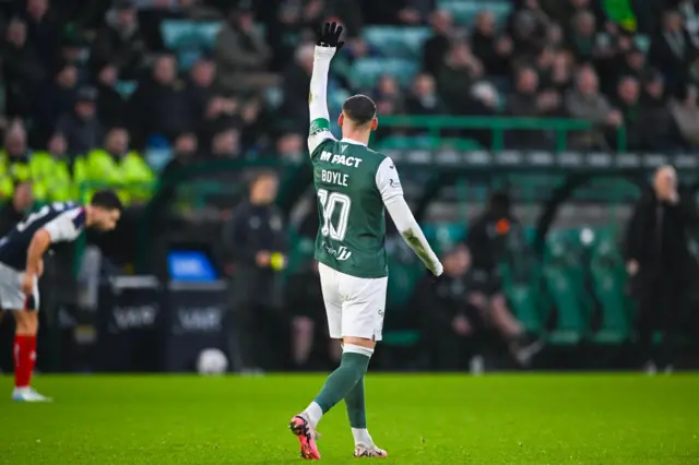 Martin Boyle waves after scoring his penalty