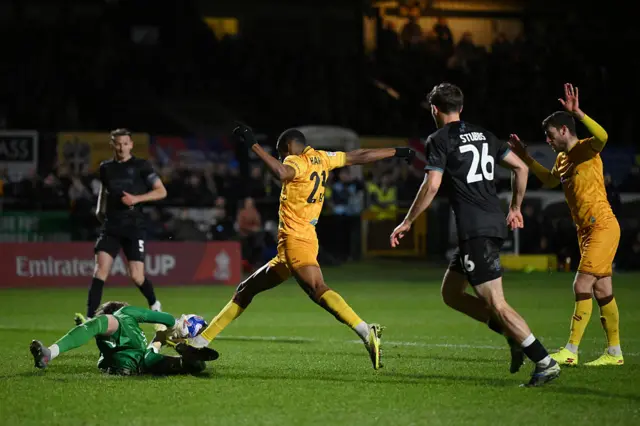 Shrewsbury Town's Will Brook saves from Jayden Harris