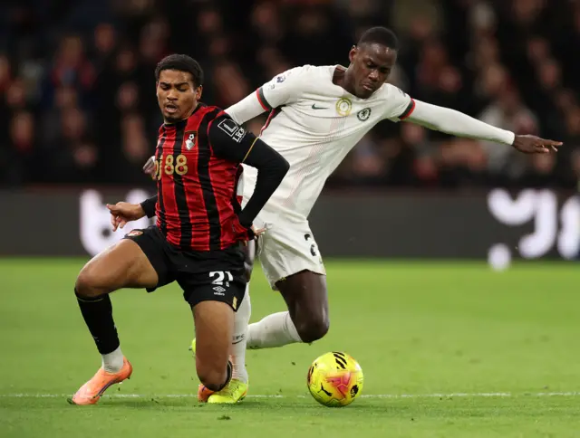 Amine Adli of AFC Bournemouth is challenged by Trevoh Chalobah of Chelsea