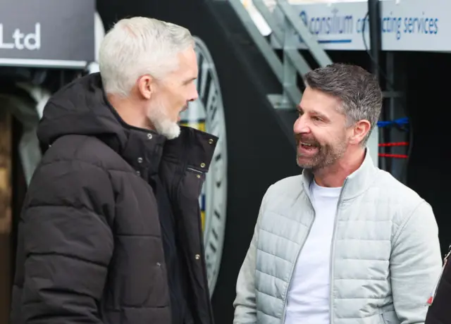 Dundee United boss Jim Goodwin in conversation with St Mirren manager Steven Robinson