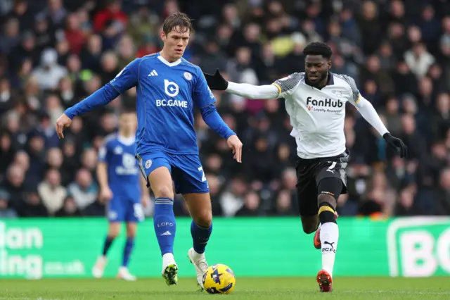 Leicester City's Jannik Vestergaard (left) and Derby County's Patrick Agyemang
