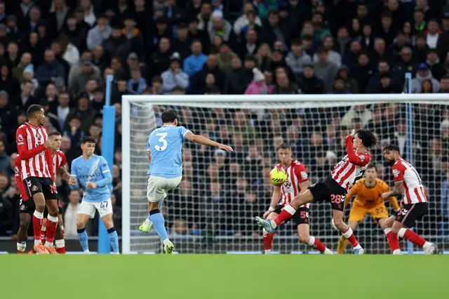 Ruben Dias scoring a goal
