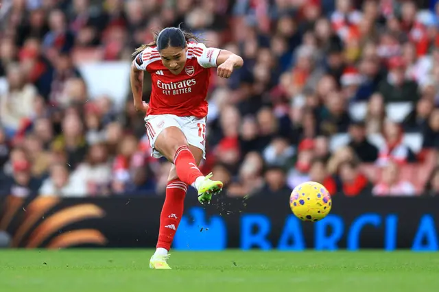 Olivia Smith of Arsenal scores his team's first goal during the Barclays Women's Super League match between Arsenal and Liverpool at Emirates Stadium on December 06, 2025 in London, England.