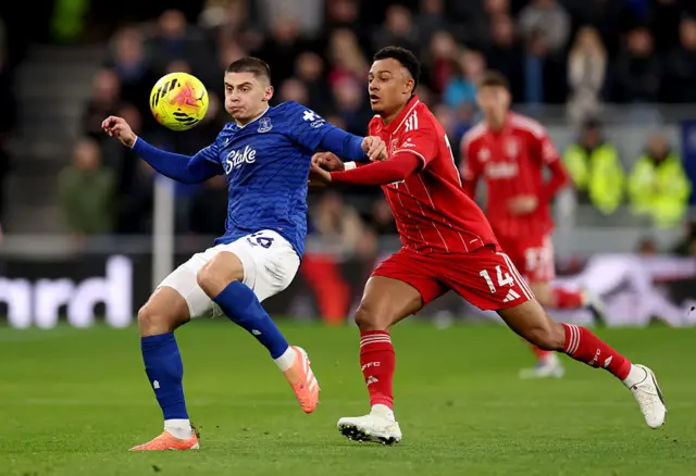 Vitaliy Mykolenko of Everton is put under pressure by Dan Ndoye