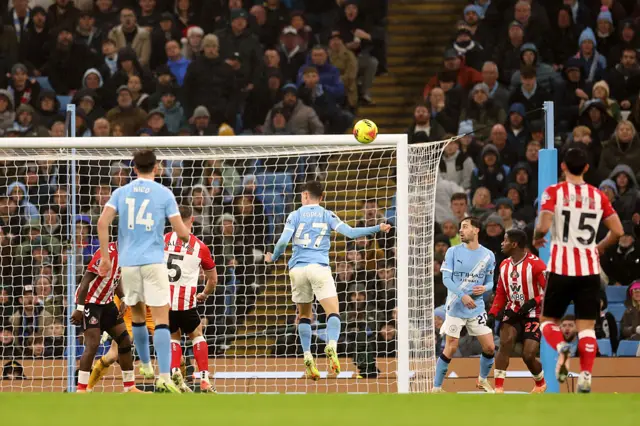 Phil Foden scoring a goal via a header