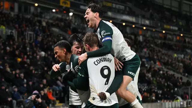 Boro celebrate their third goal at Hull