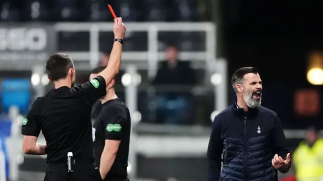 Kilmarnock manager Stuart Kettlewell is shown a red card by referee Kevin Clancy