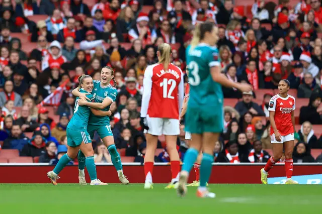 Beata Olsson of Liverpool celebrates scoring her team's first goal with teammate Kirsty MacLean of Liverpool during the Barclays Women's Super League match between Arsenal and Liverpool at Emirates Stadium on December 06, 2025 in London, England.
