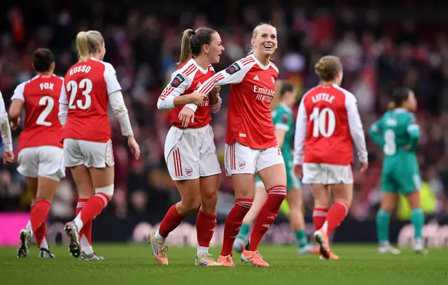 Stina Blackstenius of Arsenal celebrates scoring her team's second goal with teammate Katie McCabe during the Barclays Women's Super League match between Arsenal and Liverpool at Emirates Stadium on December 06, 2025 in London, England.
