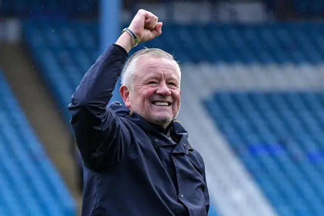 Chris Wilder raises his fist in celebration