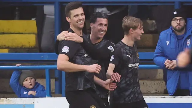 Adam Lecky celebrates