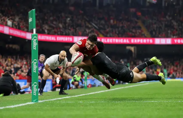 Louis Rees-Zammit dives to score for Wales against New Zealand
