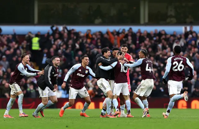 Aston Villa players celebrating a late goal