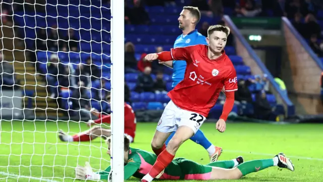 Patrick Kelly scores for Barnsley at Peterborough