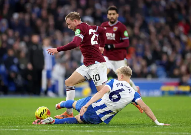 Jarrod Bowen of West Ham United is challenged by Jan Paul van Hecke of Brighton & Hove Albion during the Premier League match between Brighton & Hove Albion and West Ham United at Amex Stadium on December 07, 2025 in Brighton, England.