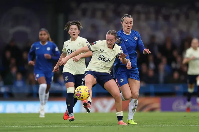 Ornella Vignola of Everton is challenged by Lucy Bronze of Chelsea during the Barclays Women's Super League match between Chelsea FC and Everton at Kingsmeadow on December 07, 2025 in Kingston upon Thames, England.