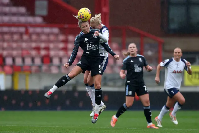 Rachel Daly of Aston Villa and Eveliina Summanen of Tottenham Hotspur battle for the ball during the Barclays Women's Super League match between Tottenham Hotspur and Aston Villa at BetWright Stadium on December 07, 2025 in London, England.