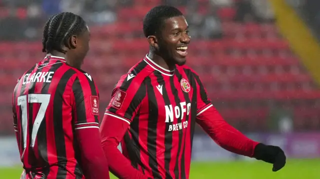 Dan Kanu celebrates for Walsall